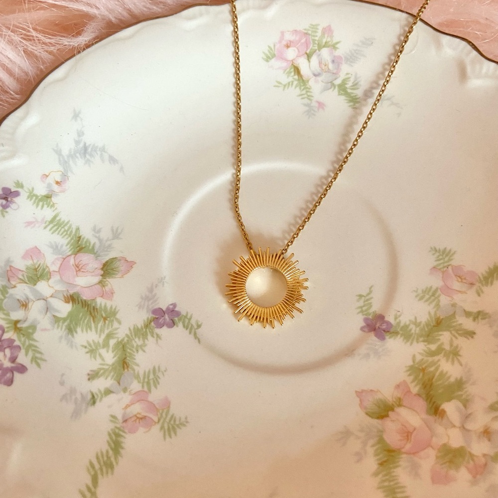 Gold sun necklace